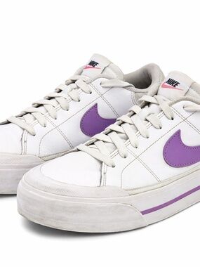 Nike Women's White Sneakers with Purple Swoosh and Pink Accent
